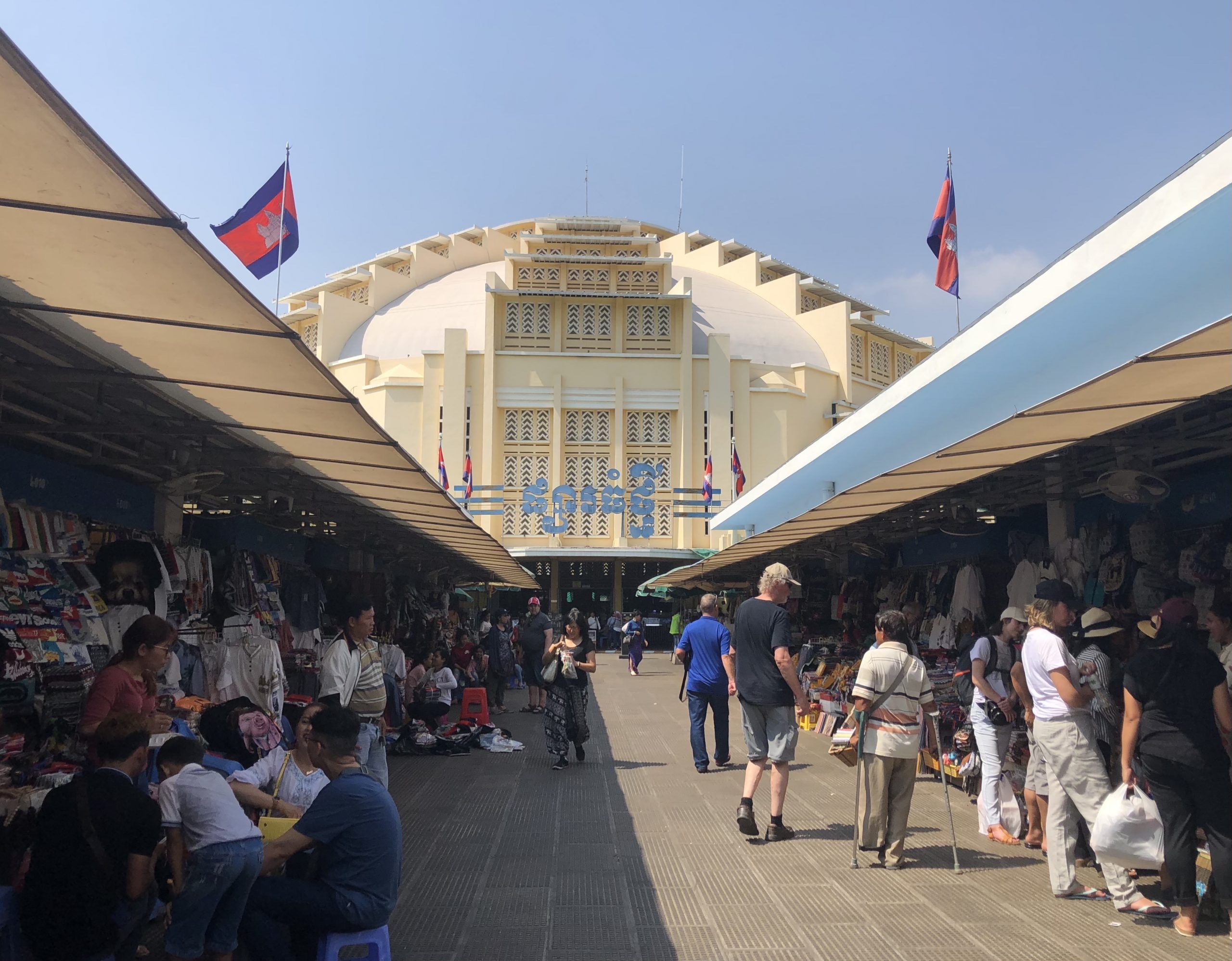 In front of the iconic Central Market (Phsar Thmey) dome in Phnom Penh, Cambodia